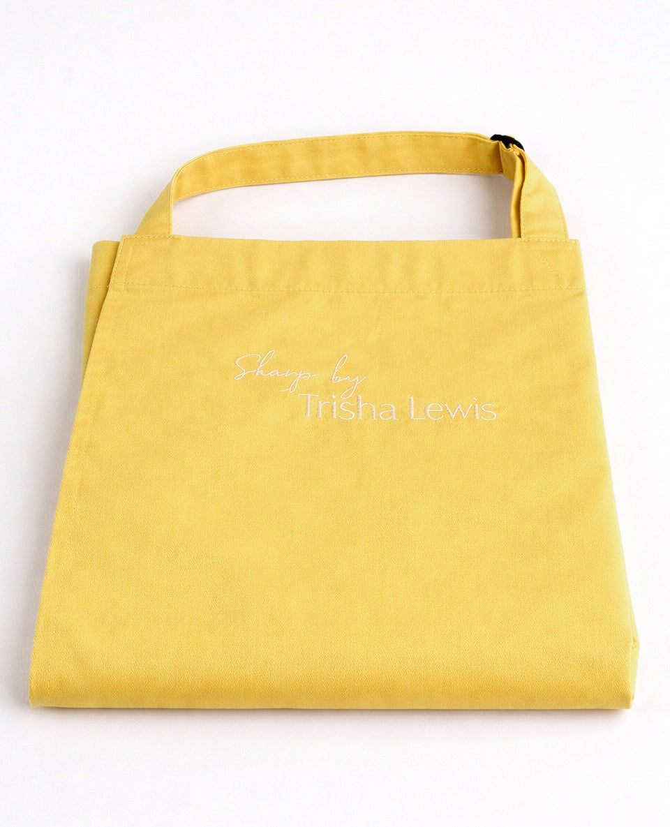 Sharp By Trisha Lewis Apron in Lemon